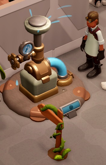 De Sprinkler Pump is een kleine Machine met ronde sproeikop bovenaan en een kraantje met wijzeplaat aan de zijkant. Een Science Enthusiast bekijkt de Pomp van rechts. Onderaan is een houten pijl zichtbaar.